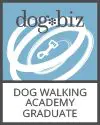 A badge that says dog walking academy graduate.